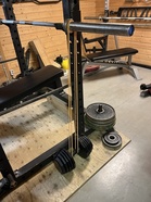 Kumin kiinnitys käsipainoon